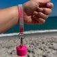 Pink/Mint Lion Latch Wristlet – Hydration Meets Convenience!